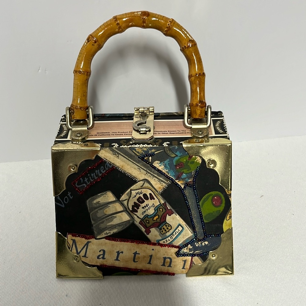 Super cute vintage “martini” cigar box purse with Rattan handle.